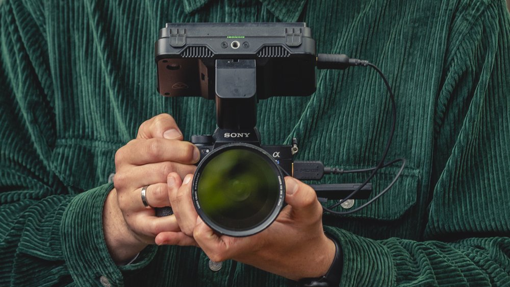 Closeup of camera being held