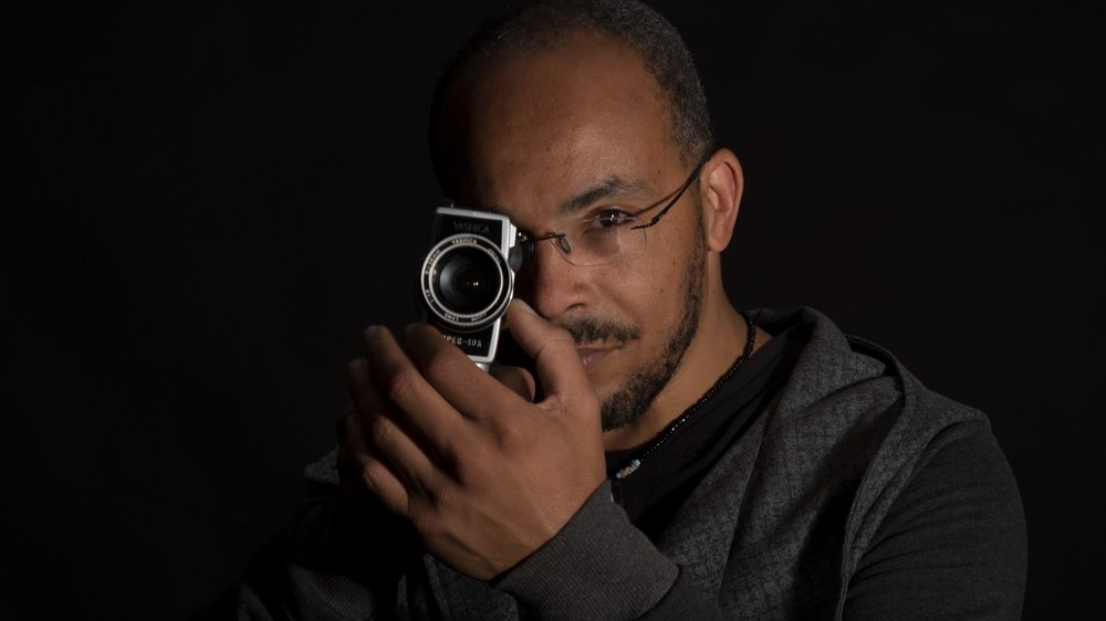 Chris holding old camera