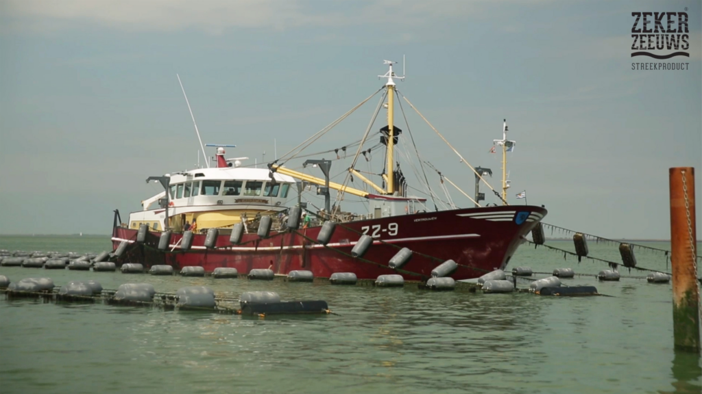 Fishing ship docked at pier