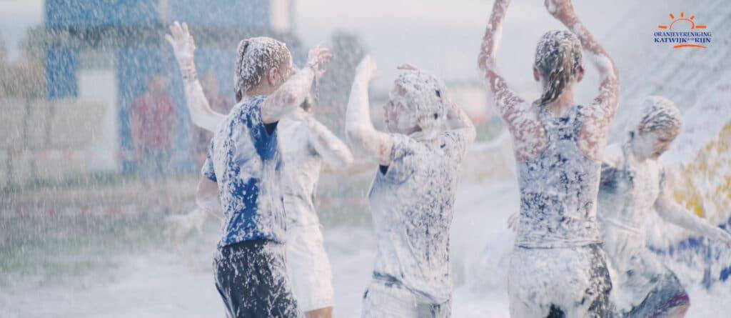 People at event covered in foam