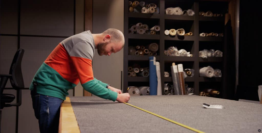 Man measuring materials